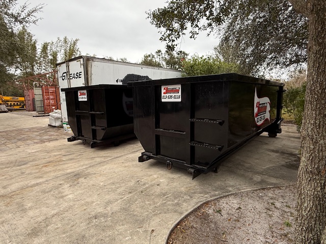 Tampa Bay Junkaneers fleet of roll-off dumpsters available for rental